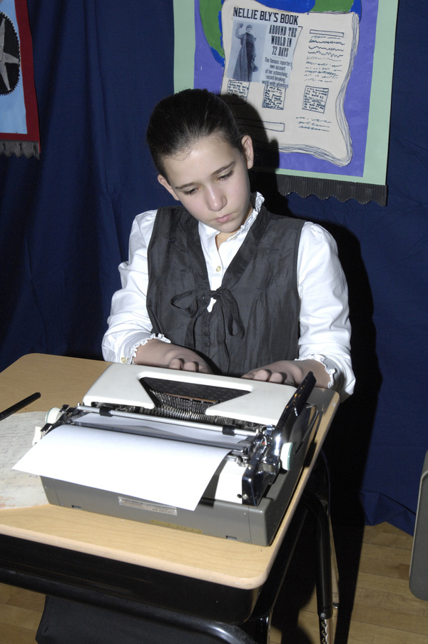 Catherine Spolarich as Nellie Bly.