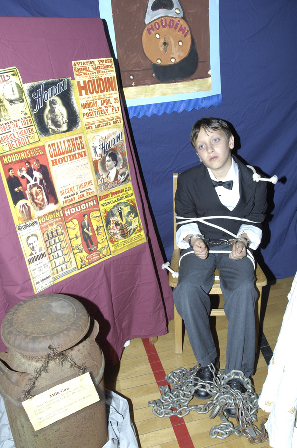 Zeb Kinney as Harry Houdini.