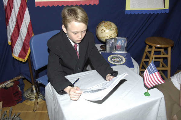 Jake Esposito as George W. Bush..