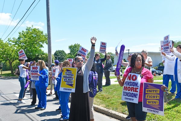 Members of 1199SEIU United Healthcare Workers East held an informational picket on Thursday afternoon at Southampton Hospital.   DANA SHAW