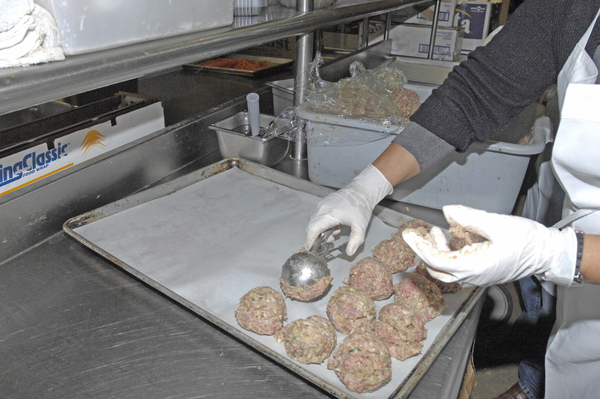 Trays of meatballs were prepared this morning for the annual Southampton rotary Club Spaghetti Dinner. DANA SHAW