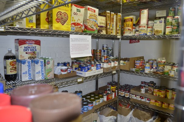 The Bridgheampton Food Pantry is stocked with non-perishables. KELLY ZEGERS