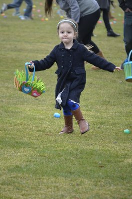 at the annual Southampton Village PBA Easter Egg Hunt in Agawam Park on Friday. BY ERIN MCKINLEY