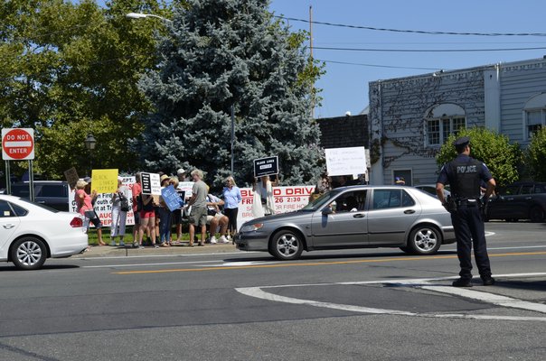 Black Lives Matter supporters post up on on Ferry Road