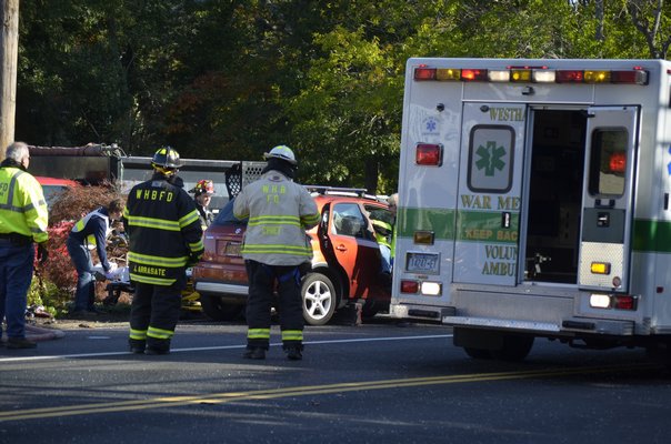 A crash temporarily closed Montauk Highway on Quiogue on Monday morning. BY ERIN MCKINLEY