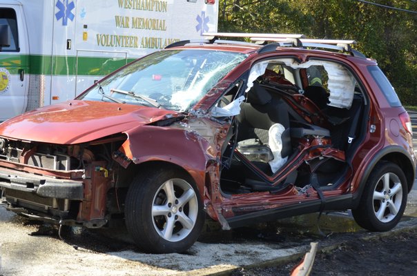 A crash temporarily closed Montauk Highway on Quiogue on Monday morning. BY ERIN MCKINLEY