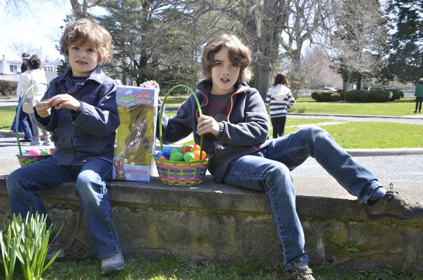 Brothers Max and Jack Petscheitis with their eggs at the LVIS Easter Egg Hunt on Saturday. SHAYE WEAVER