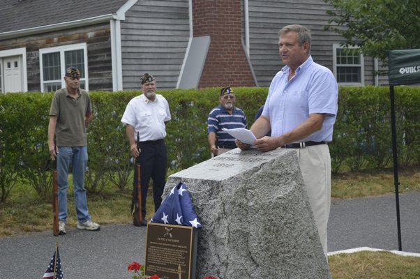  residents of Sag Harbor gathered to dedicate a flagpole in honor of the 200 year anniversary of a War of 1812 battle that took place at a na