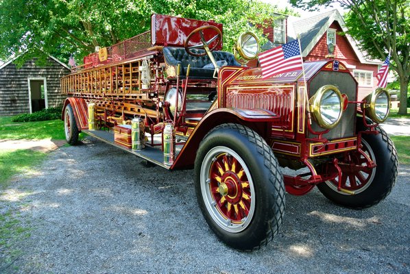 The Southampton Fire Department's 1912 American-LaFrance ladder truck at the Southampton Fire Department's antique fire truck show at the Southampton Historical Museum on Saturday. DANA SHAW