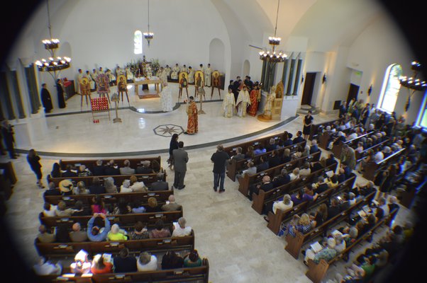 The Dormition of the Virgin Mary Greek Orthodox Church of the Hamptons held its official door opening ceremony on Thursday morning. Archbishop Demetrios of America presided over the ceremonies. More than 250 people attended. BRANDON B. QUINN