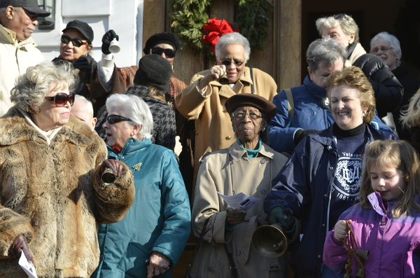 A large crowd gathered in front of the First Presbyterian Church of Southampton to ring their bells to celebrate the change that came about because of the Emancipation Proclamation.
