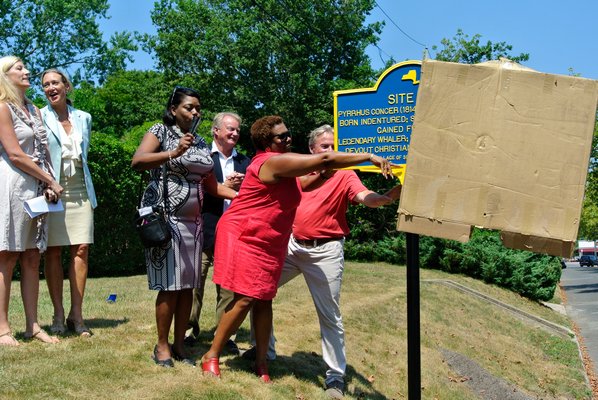 The historical marker is unveiled.