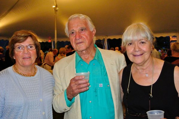 Beau and Patricia Hulse with Marianne Nugent at the Sacred Hearts of Jesus and Mary Tent Party on Saturday night. DANA SHAW