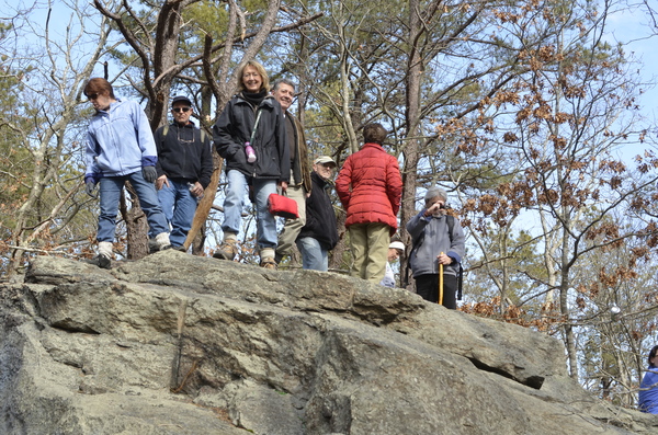 Southampton Trails Preservation Society participants stand atop of Split Rock