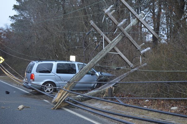 Some Tuckahoe residents and the entire Stony Brook Southampton College campus lost power after a minivan struck a utility pole on Tuckahoe Road. BRANDON B. QUINN