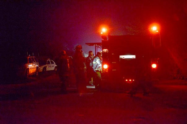 Fire police blocked the entrance of Highway Behind the Pond so that emergency crews could get to the fire on East Dune Lane. Firefighters got the flame down in about 20 minutes. SHAYE WEAVER