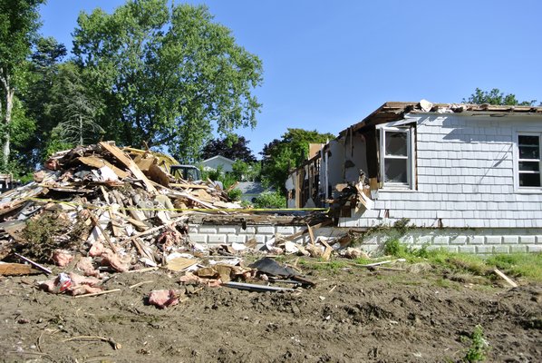 The demolition of the Concer house in August of 2014.  DANA SHAW