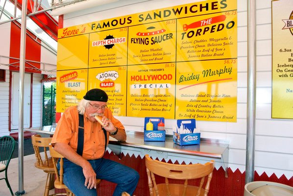 Will Hansen samples a Nathan's hot dog at the new cafe.