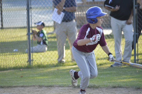 A Southampton 9-10 All-Star celebrates a RBI-single in the victory over the East End. Morley Quatroche