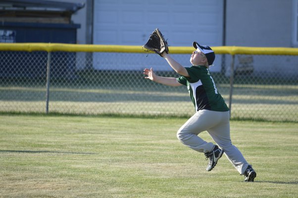 An East End 9-10 all-star tracks down a fly ball in the loss to Southampton on Friday. Morley Quatroche III