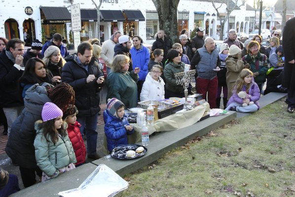 The menorah was lit in Southampton Village on Friday afternoon.  DANA SHAW