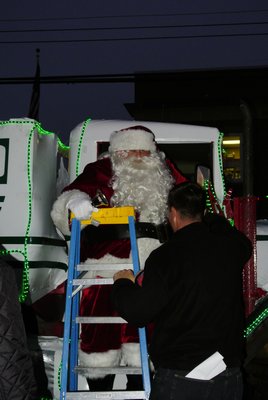 Santa arrives at the Hampton Bays Firehouse.