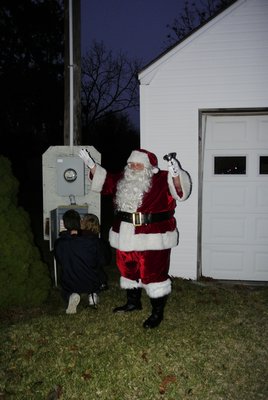 Santa leads the countdown to the treet lighting.