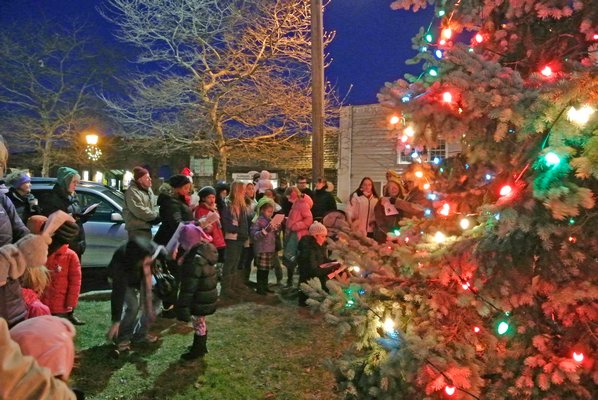 The tree and windmill were lit in Sag Harbor on Saturday evening.