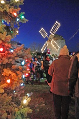 The tree and windmill were lit in Sag Harbor on Saturday evening.