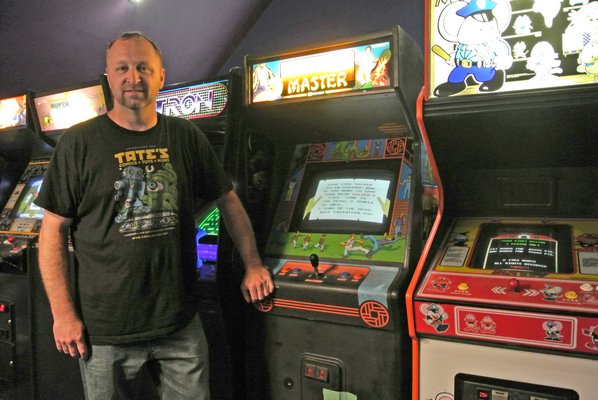 Gamers enjoy Joh Bennetts' arcade filled with old-school games. DANA SHAW