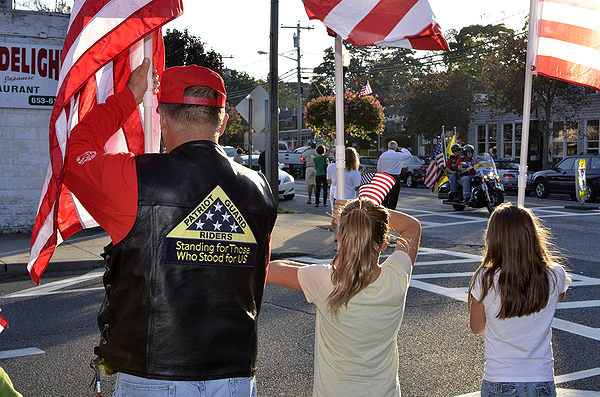 The East Quogue community and members of the Patriot Guard Riders of New York welcomed Private First Class Ronan Seltenreich home on Friday at the East Quogue Fire Department. SHAYE WEAVER