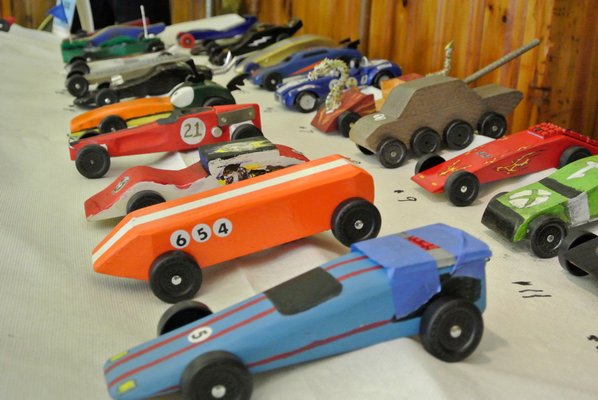A variety of handmade cars at the Pinewood Derby.