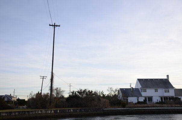 One of the circuits on the East End that is being upgraded by PSEG using federal money goes across the Quogue Canal in Quogue. BY GREG WEHNER