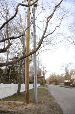 PSEG Long Island crews have been replacing electric poles along Old Depot Road in Quogue as part of an upgrade to the grid on the East End that is being paid for with federal money. BY GREG WEHNER