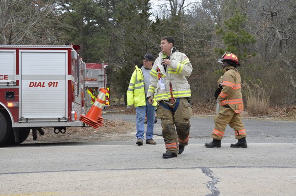 Emergency responders at the scene Friday afternoon. GREG WEHNER