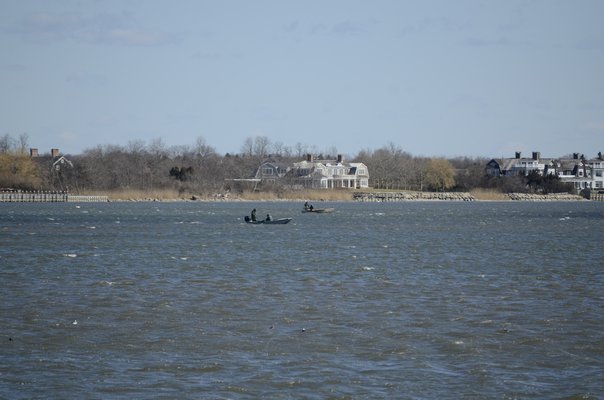 The Southampton Town Trustees opened Mecox Bay to dredging for oysters during the month of April. GREG WEHNER