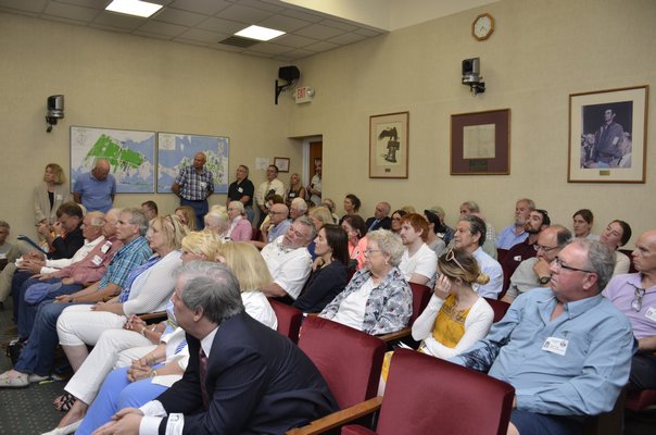 Southampton residents filled Town Hall on Monday to speak out about a deal made between the Town Trustees and a homeowner on Rose Hill Road in Water Mill. GREG WEHNER