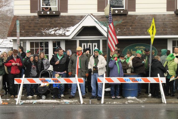 Hundreds crowded the streets of Hampton Bays to watch the hamlet's 11th annual St. Patrick's Day parade on Saturday morning. KYLE CAMPBELL