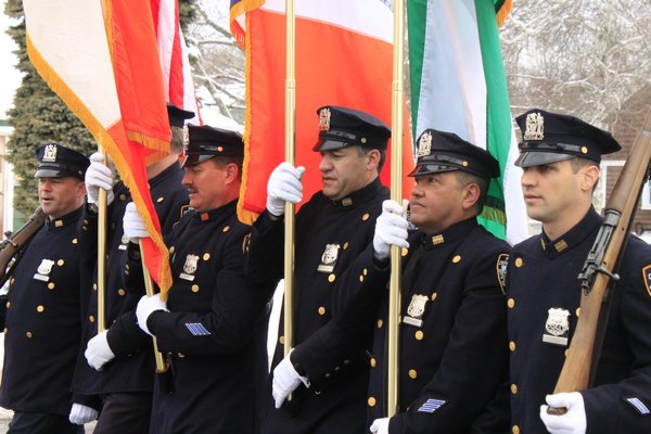 The New York City Police Department Color Guard marched in the 11th annual Hampton Bays St. Patrick's Day parade on Saturday morning. KYLE CAMPBELL