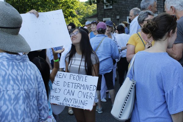 Demonstrators at the Bridgehampton Child Care and Recreational Center stand in solidarity with those hurt at the white pride rally in Charlottesville