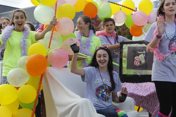  participate in their district’s annual homecoming parade on Friday afternoon. KATE RIGA PHOTOS
