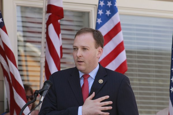 U.S. Representative Lee Zeldin says the Pledge of Allegiance before holding a press conference to announce a partnership between the Peconic Bay Medical Center and the Department of Veterans Affairs that will help serve veterans on the East End. KYLE CAMPBELL