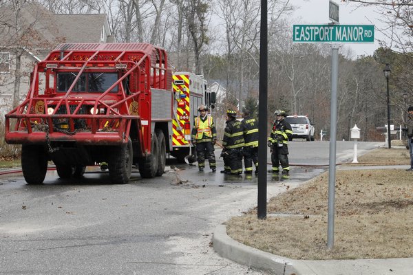 Volunteers from the Eastport and Center Moriches fire departments as well as the East Moriches Ambulance Corps responded to brushfires on Eastport-Manor Road in Eastport Wednesday afternoon. KYLE CAMPBELL