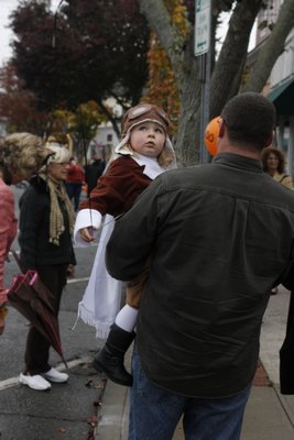 Becky and Adam McDaid dressed as bananas with their little monkey