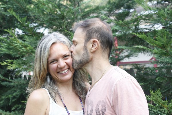 Ken Mayer kisses his wife Melissa Mayer of eight years. VALERIE GORDON