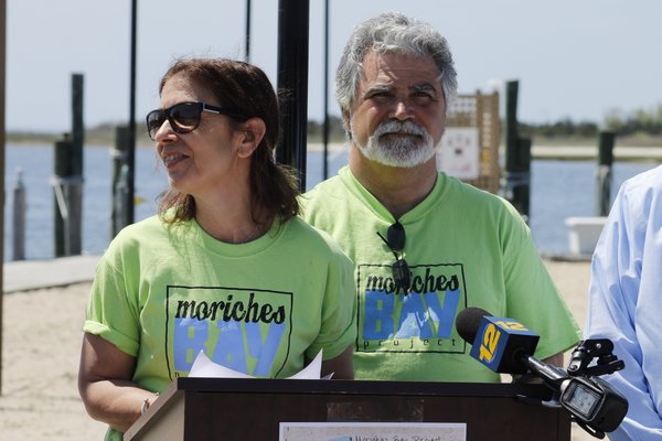  Stan Glinka and Christine Scalera converse during a press conference held by the Moriches Bay Project on Friday afternoon in East Moriches. KYLE CAMPBELL