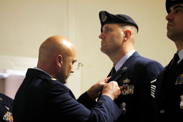  Technical Sergeant Eric Auletta and Senior Airman Brian Hammel were each honored with a Purple Heart medal Sunday afternoon at the Eastport American Legion Hall. KYLE CAMPBELL