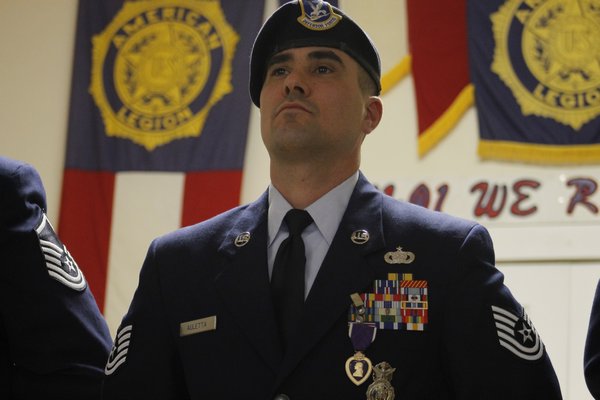 Air National Guard Technical Sergeant Eric Auletta received a Purple Heart medal on Saturday afternoon in Eastport. KYLE CAMPBELL