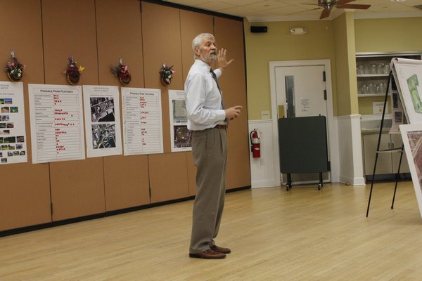 Southampton Town Deputy Supervisor Frank Zappone speaks to community members about ideas for the proposed Good Ground Park on Monday. BY CAROL MORAN