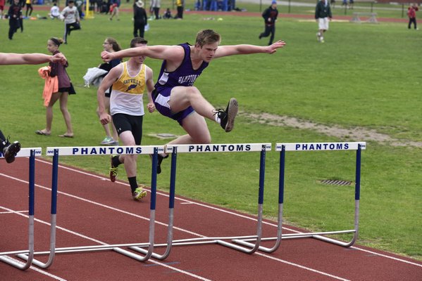 Tom O'Shea of Hampton Bays in the hurdles. RICCI PARADISO